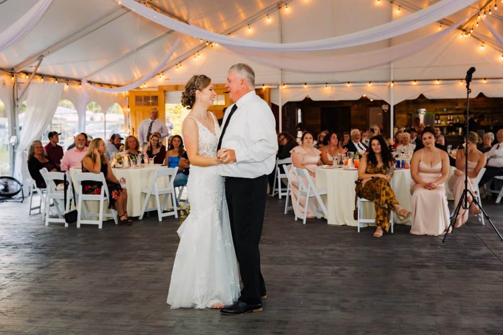 Wedding couple dancing at Lupines & Lace venue.