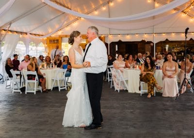 Wedding couple dancing at Lupines & Lace venue.